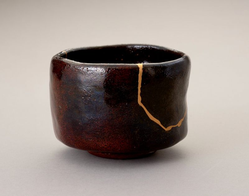 An Exceptional Antique Raku Tea Bowl with Gold Repair