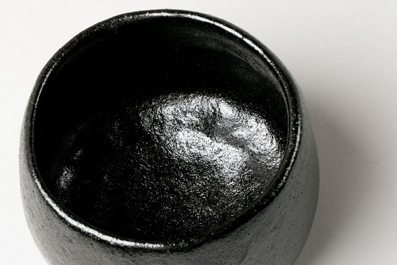 A Classic Black Raku Tea Bowl by Famed Potter Ōhi Chōzaemon X