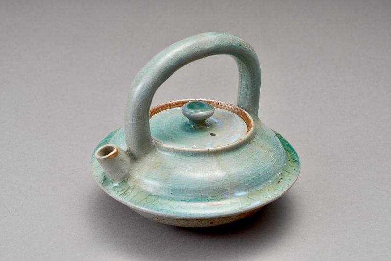 An Antique Celadon Chōshi for Sake with a Beautiful Gold Repair