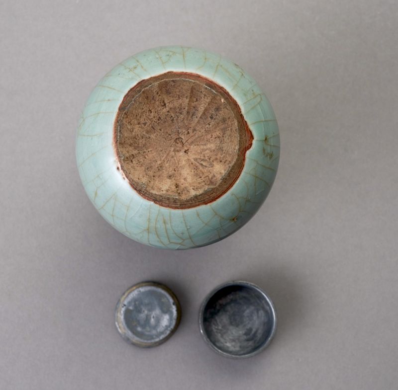An Antique Celadon Tea Container with Pewter Cap