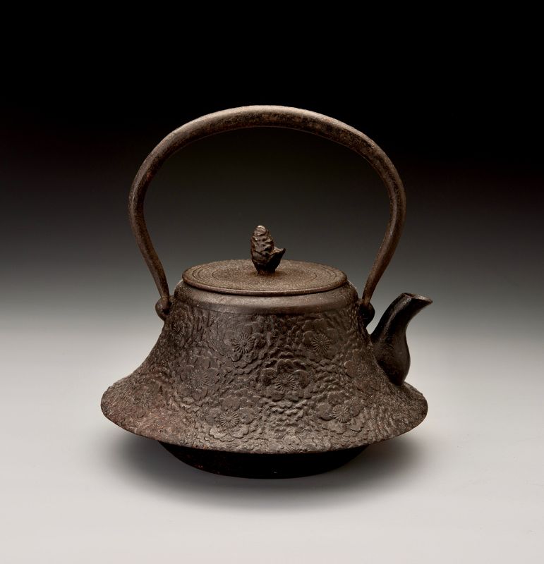 A Meiji Period “Tetsubin” Cast Iron Kettle with Cherry Blossom Motif