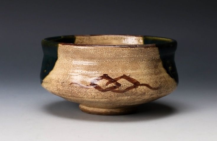 An Edo Period Oribe Tea Bowl with Green Glaze