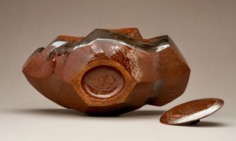 A Red “Ame” Glazed Mizusashi by 11th Generation Ōhi Chozaemon