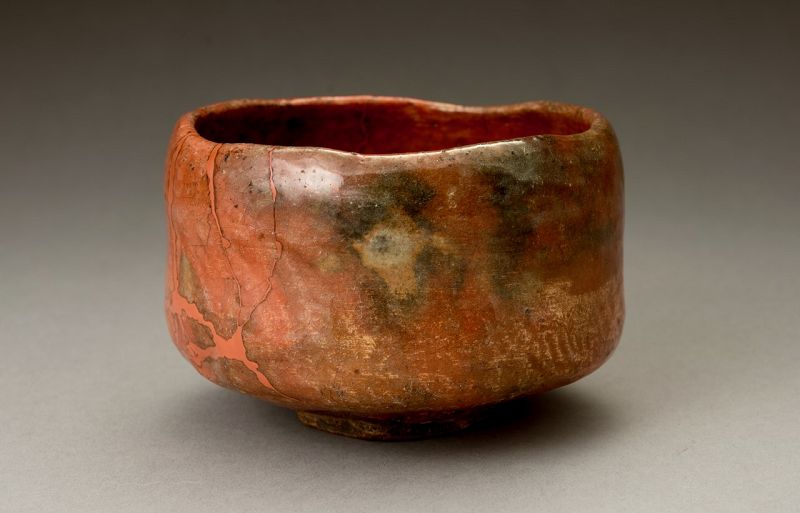 A Raku IX (Ryônyû) Red Tea Bowl with Extraordinary Lacquer Repairs
