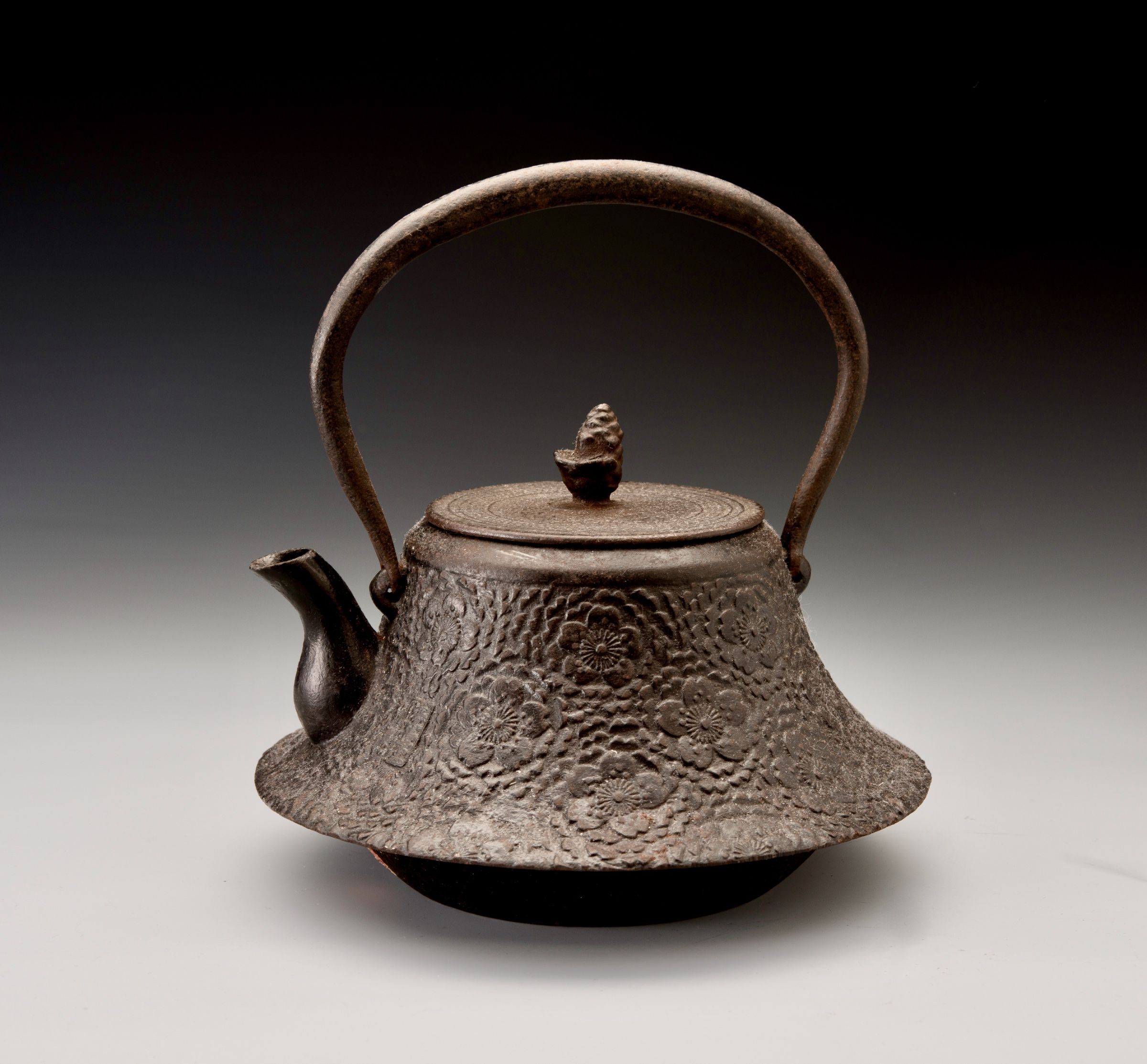 A Meiji Period “Tetsubin” Cast Iron Kettle with Cherry Blossom Motif