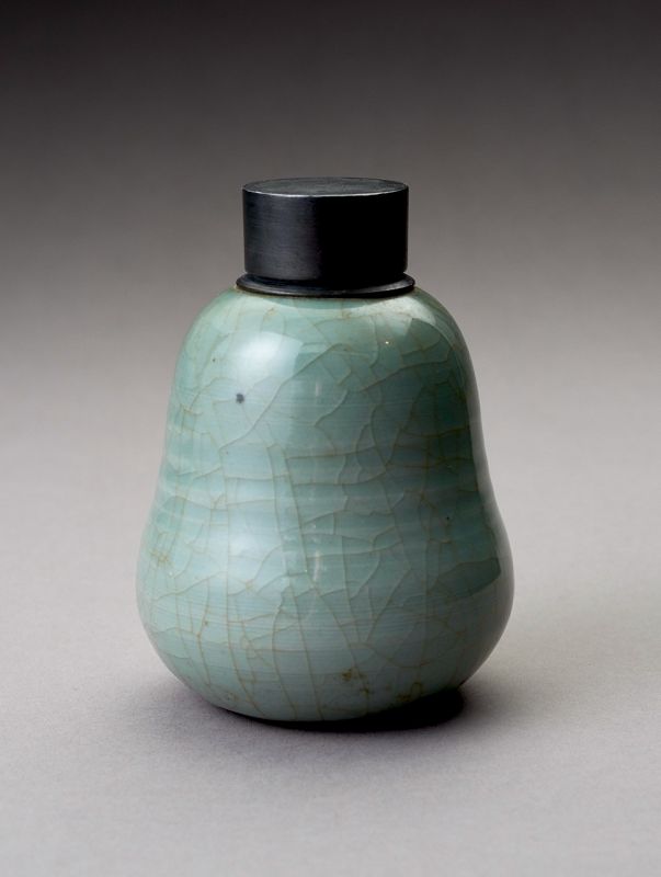 An Antique Celadon Tea Container with Pewter Cap
