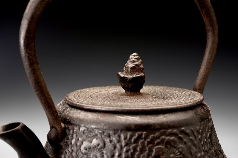 A Meiji Period “Tetsubin” Cast Iron Kettle with Cherry Blossom Motif