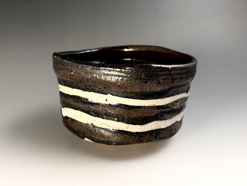 A Feldspar Striped Edo Period Oribe Tea Bowl