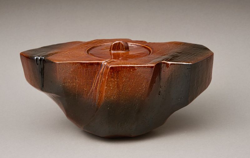 A Red “Ame” Glazed Mizusashi by 11th Generation Ōhi Chozaemon