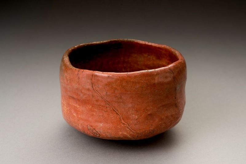 A Raku IX (Ryônyû) Red Tea Bowl with Extraordinary Lacquer Repairs