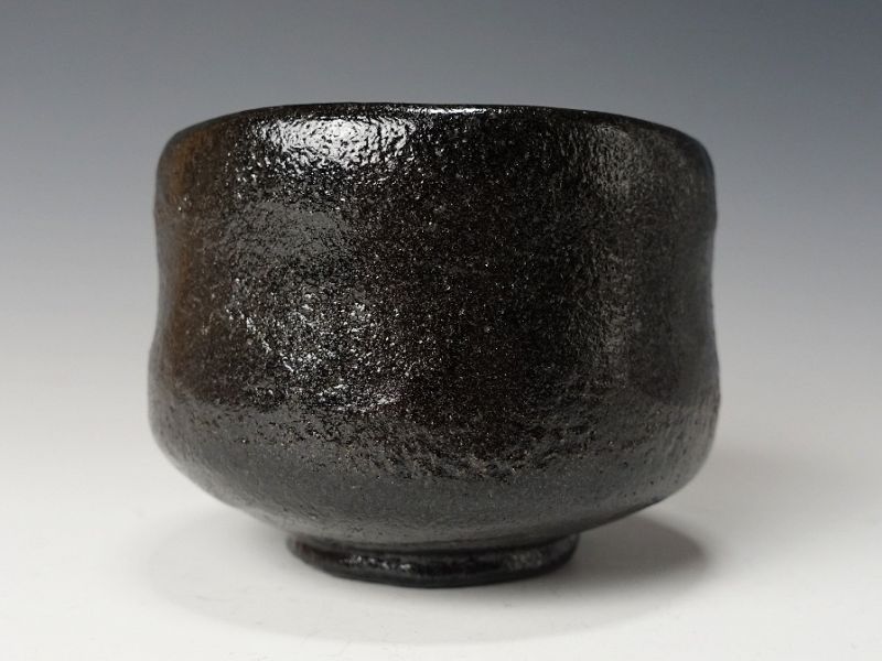 A Black Raku Tribute Tea Bowl by Kiraku Kizu