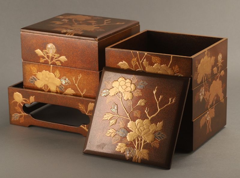 A Meiji Period Maki-e Gold Painted Five-tiered Jubako Set