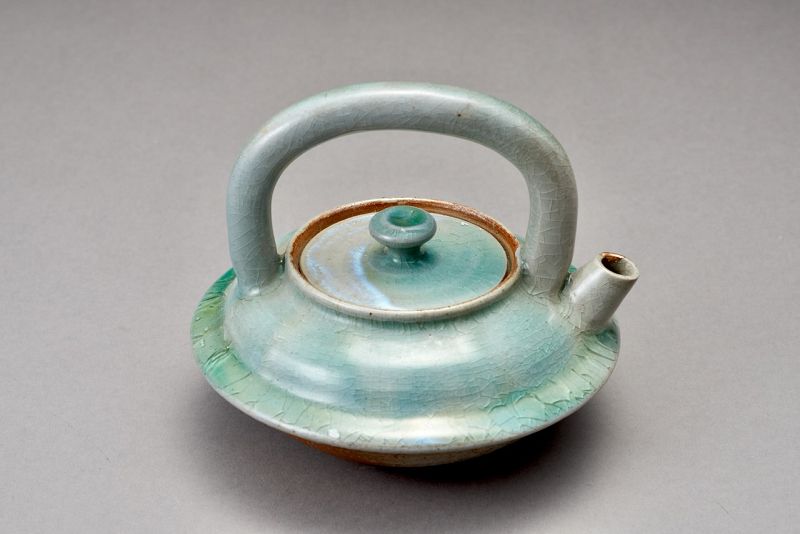 An Antique Celadon Chōshi for Sake with a Beautiful Gold Repair