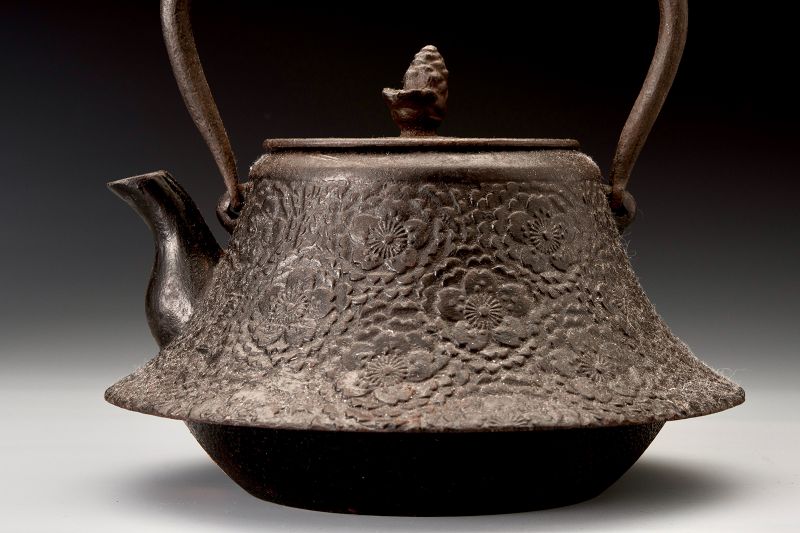 A Meiji Period “Tetsubin” Cast Iron Kettle with Cherry Blossom Motif