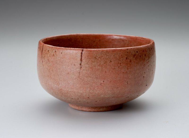 A Red Raku Tea Bowl by Tamamizu III - Nindosai (d.o.b. unknown -1763)