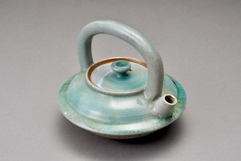 An Antique Celadon Chōshi for Sake with a Beautiful Gold Repair