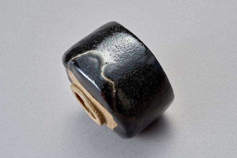 A Classic Black Raku Tea Bowl by Ōhi Chōzaemon IX