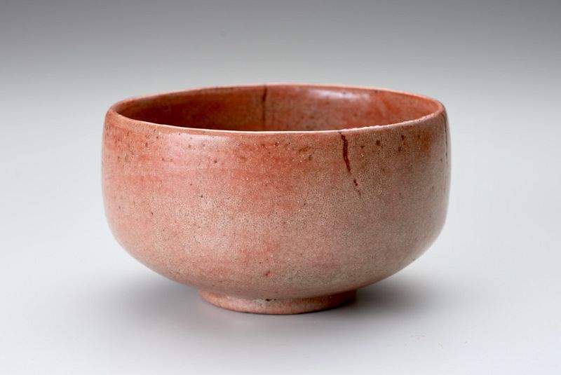 A Red Raku Tea Bowl by Tamamizu III - Nindosai (d.o.b. unknown -1763)