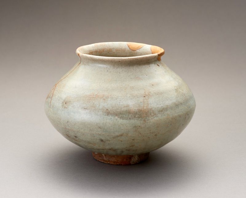 An Ancient Korean Celadon Vase with Gold Repairs