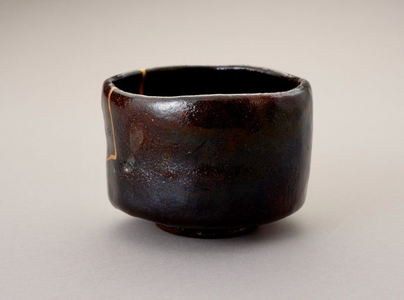 An Exceptional Antique Raku Tea Bowl with Gold Repair