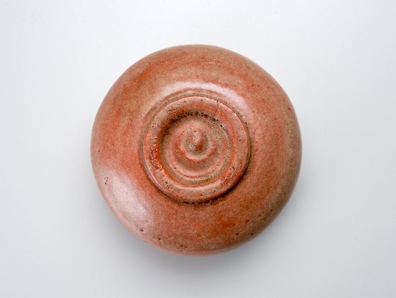 A Red Raku Tea Bowl by Tamamizu III - Nindosai (d.o.b. unknown -1763)