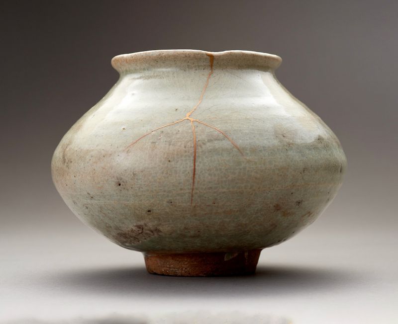 An Ancient Korean Celadon Vase with Gold Repairs