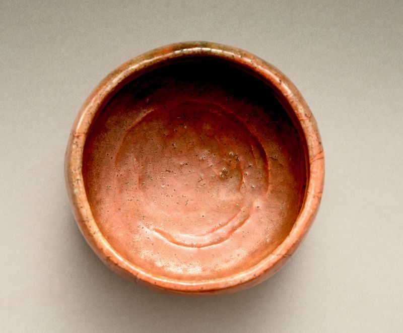 A Raku IX (Ryônyû) Red Tea Bowl with Extraordinary Lacquer Repairs