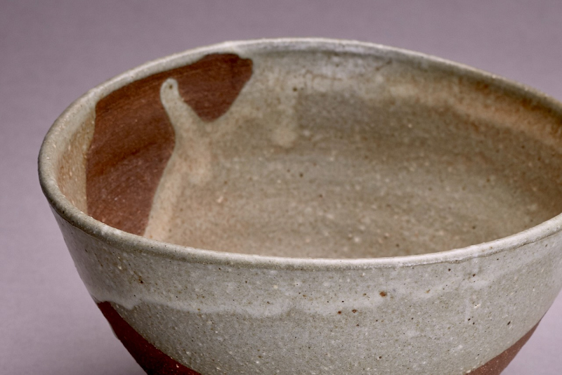An Antique Karatsu Amigasa Tea Bowl with Shifuku