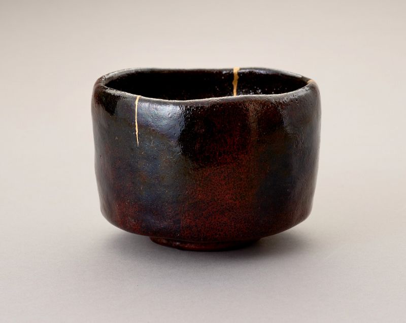 An Exceptional Antique Raku Tea Bowl with Gold Repair