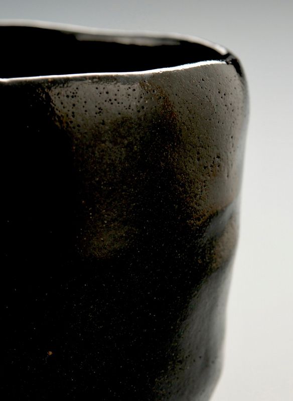 A Black Raku Tea Bowl by Ito Tozan