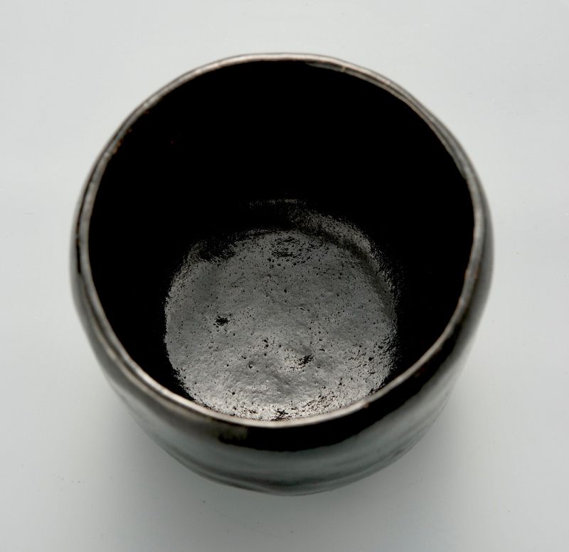 A Black Raku Tea Bowl by Ito Tozan