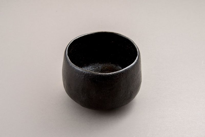 A Classic Black Raku Tea Bowl by Ōhi Chōzaemon IX