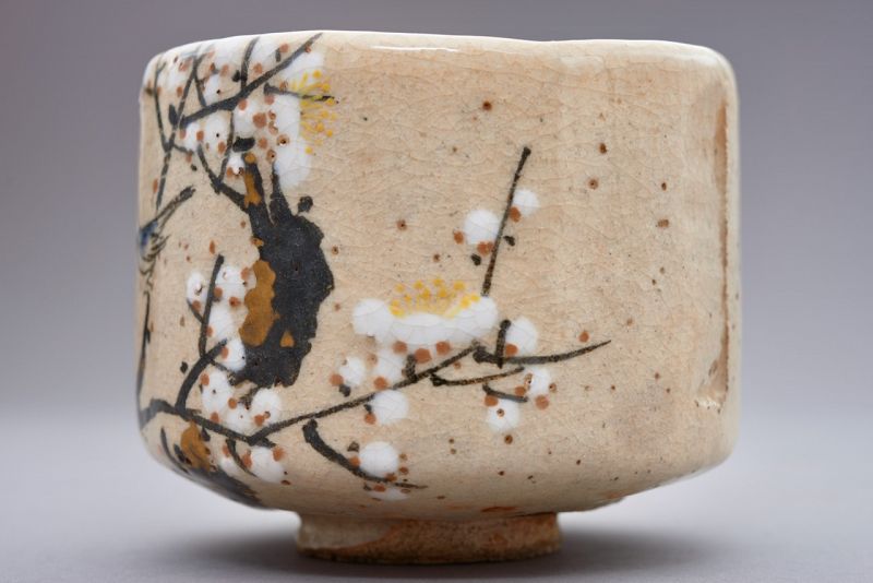 A White Raku Tea Bowl by First Generation Ito Tozan