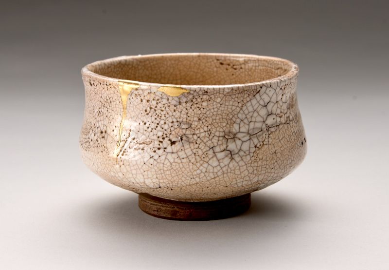An Edo Period Shino Tea Bowl with Gold Repairs