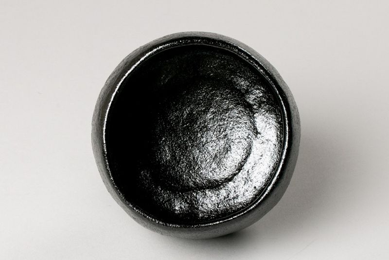 A Classic Black Raku Tea Bowl by Famed Potter Ōhi Chōzaemon X
