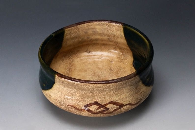 An Edo Period Oribe Tea Bowl with Green Glaze