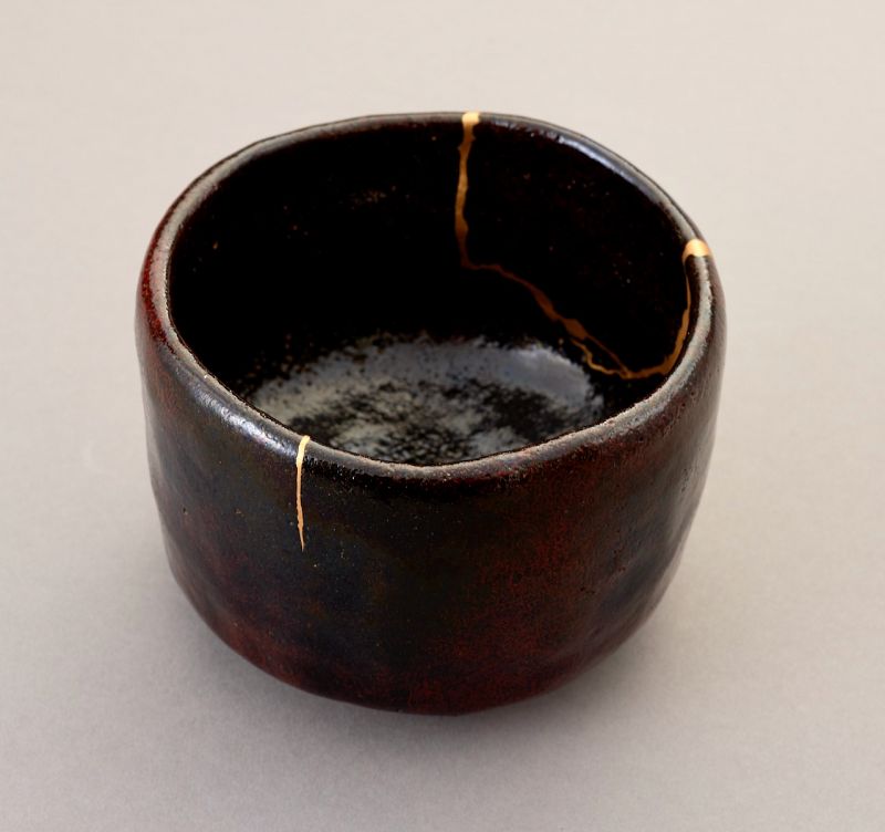 An Exceptional Antique Raku Tea Bowl with Gold Repair