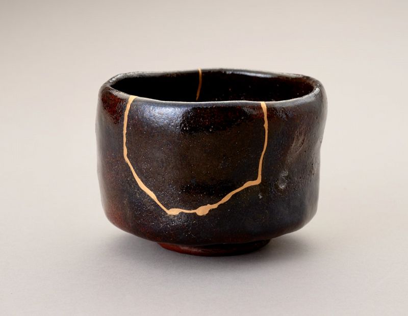 An Exceptional Antique Raku Tea Bowl with Gold Repair