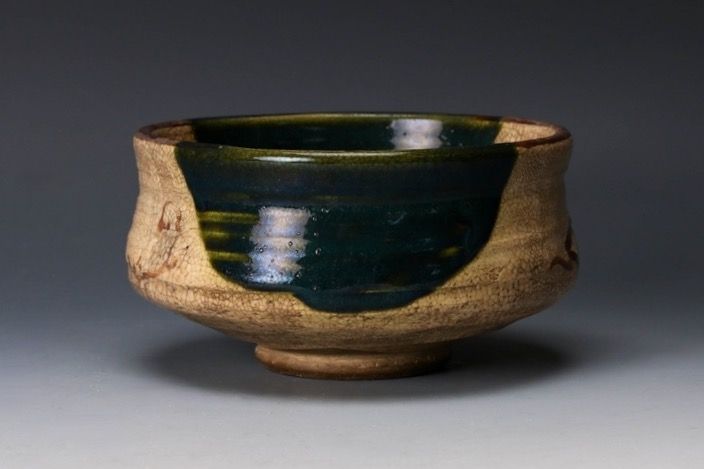 An Edo Period Oribe Tea Bowl with Green Glaze