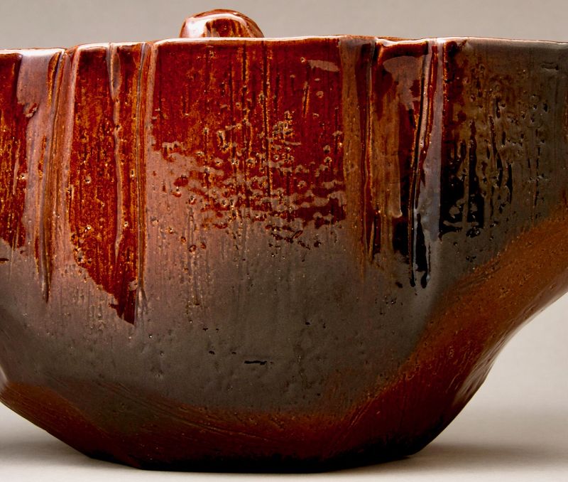 A Red “Ame” Glazed Mizusashi by 11th Generation Ōhi Chozaemon