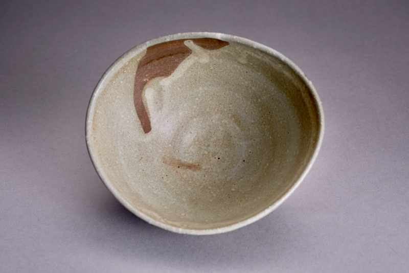 An Antique Karatsu Amigasa Tea Bowl with Shifuku