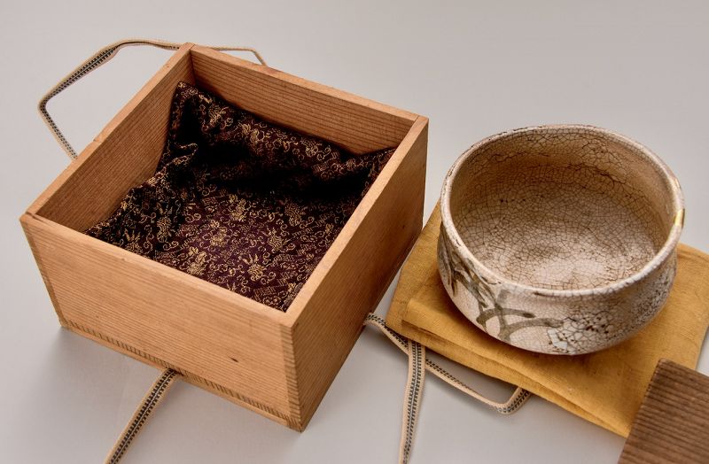 An Edo Period Shino Tea Bowl with Gold Repairs