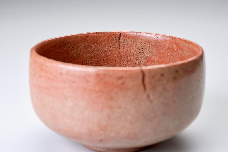 A Red Raku Tea Bowl by Tamamizu III - Nindosai (d.o.b. unknown -1763)