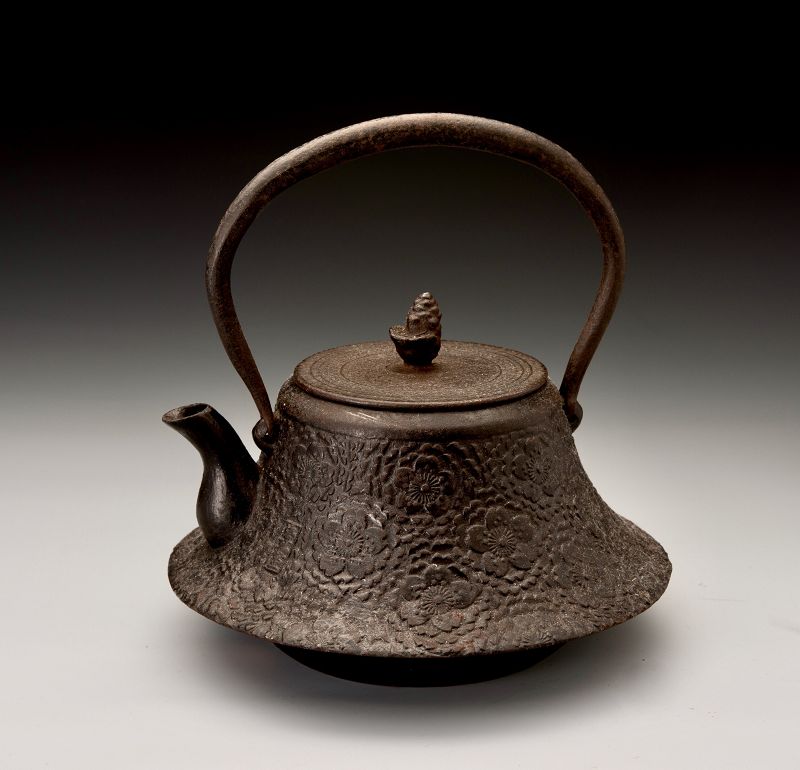 A Meiji Period “Tetsubin” Cast Iron Kettle with Cherry Blossom Motif