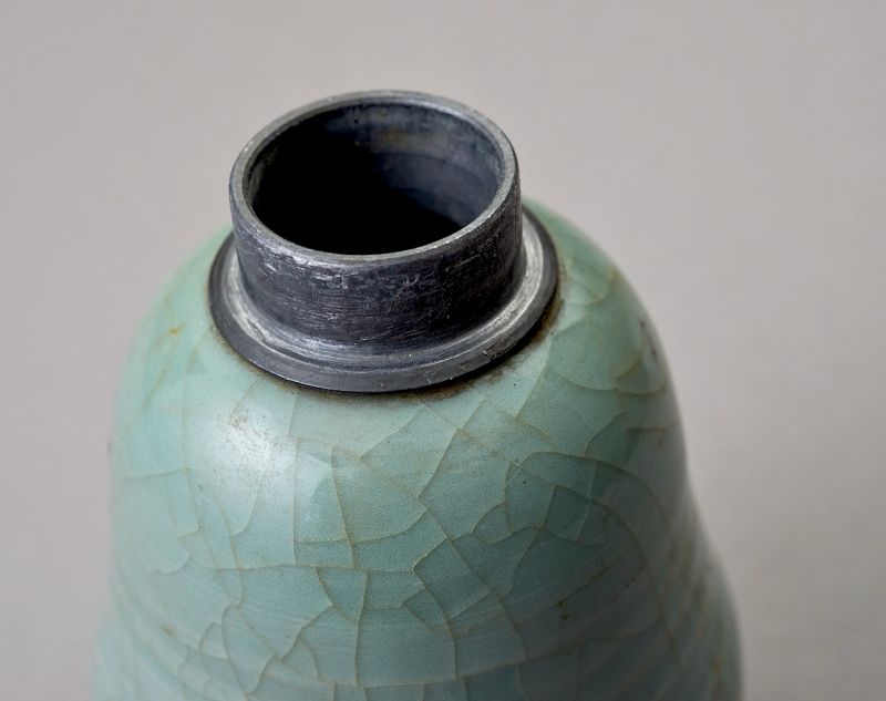 An Antique Celadon Tea Container with Pewter Cap