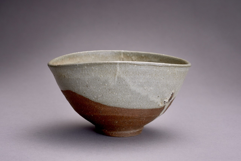 An Antique Karatsu Amigasa Tea Bowl with Shifuku