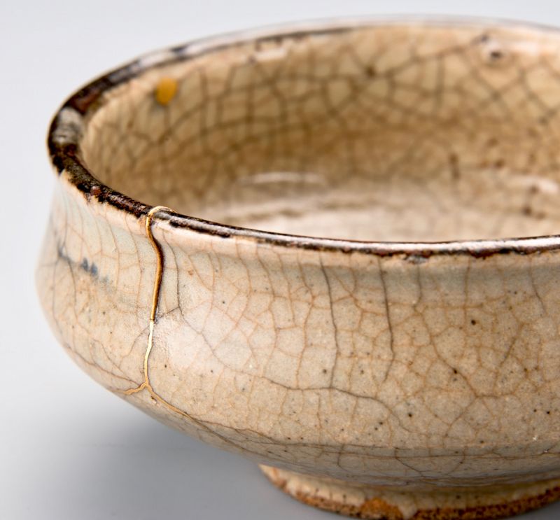 An Antique Karatsu Tea Bowl with Excellent Gold Repairs (Kintsugi)
