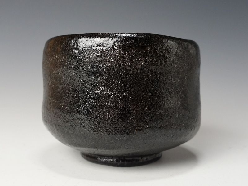 A Black Raku Tribute Tea Bowl by Kiraku Kizu