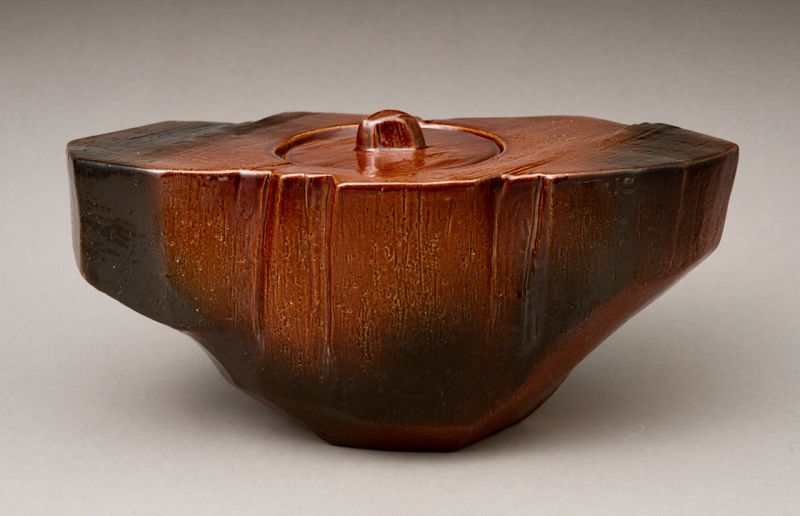 A Red “Ame” Glazed Mizusashi by 11th Generation Ōhi Chozaemon