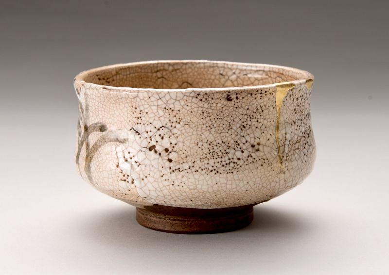 An Edo Period Shino Tea Bowl with Gold Repairs